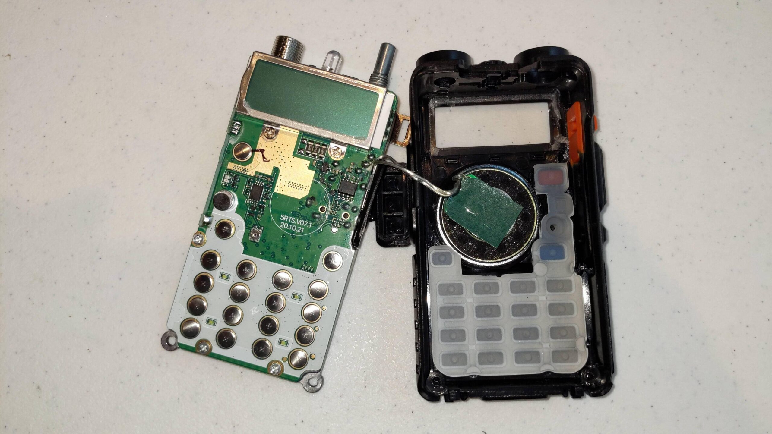 Baofeng UV5R, with internals removed from shell